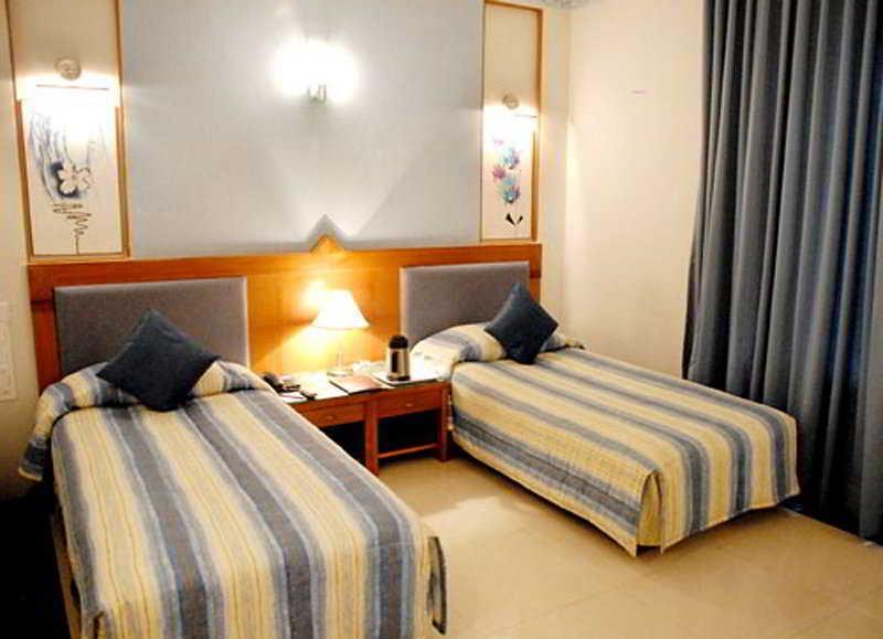 J P Cordial Hotell Bangalore Rom bilde